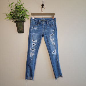 American Eagle Super Low Rise Jegging Distressed Step Hem Skinny AE 8 Jeans